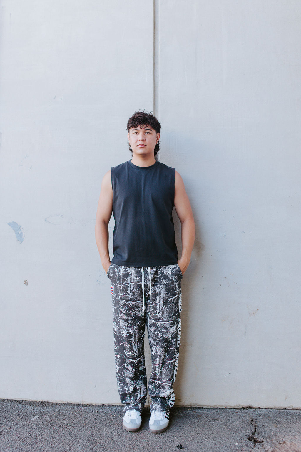 DISTRESSED SWEATS - BLACK CAMO